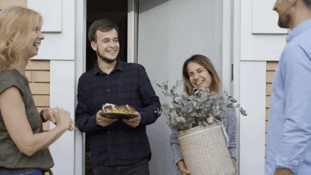 Image d'un couple accueillant ses nouveaux voisins dans la rue - Attention à la prononciation de ces mots en anglais